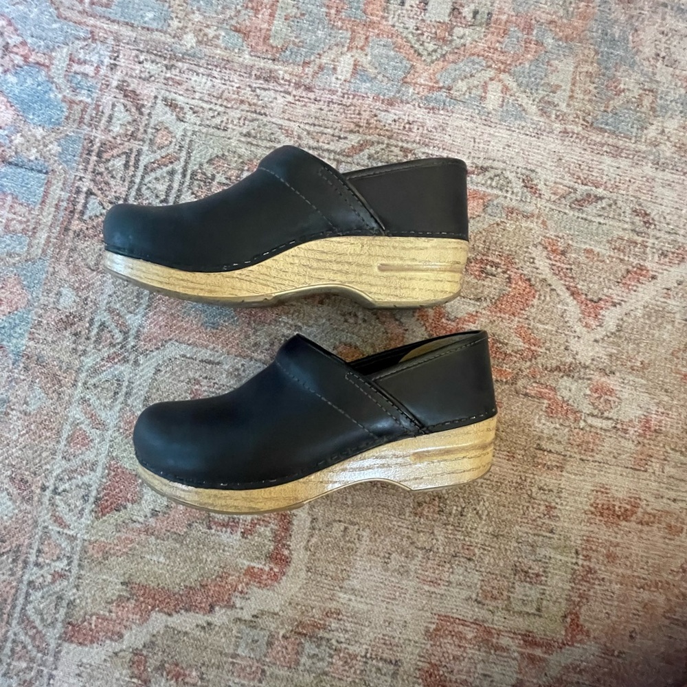 Dansko Black Leather Clogs with Wood-Effect Platform